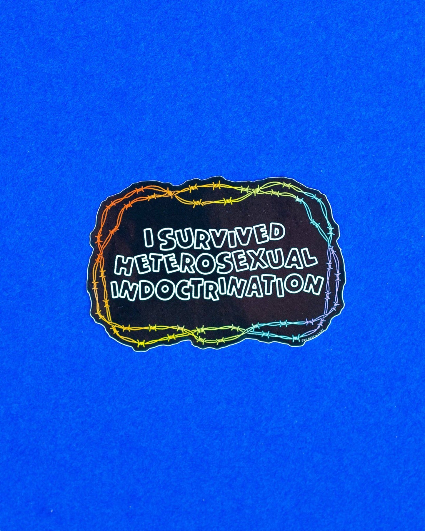 The Peach Fuzz - I Survived Heterosexual Indoctrination Sticker