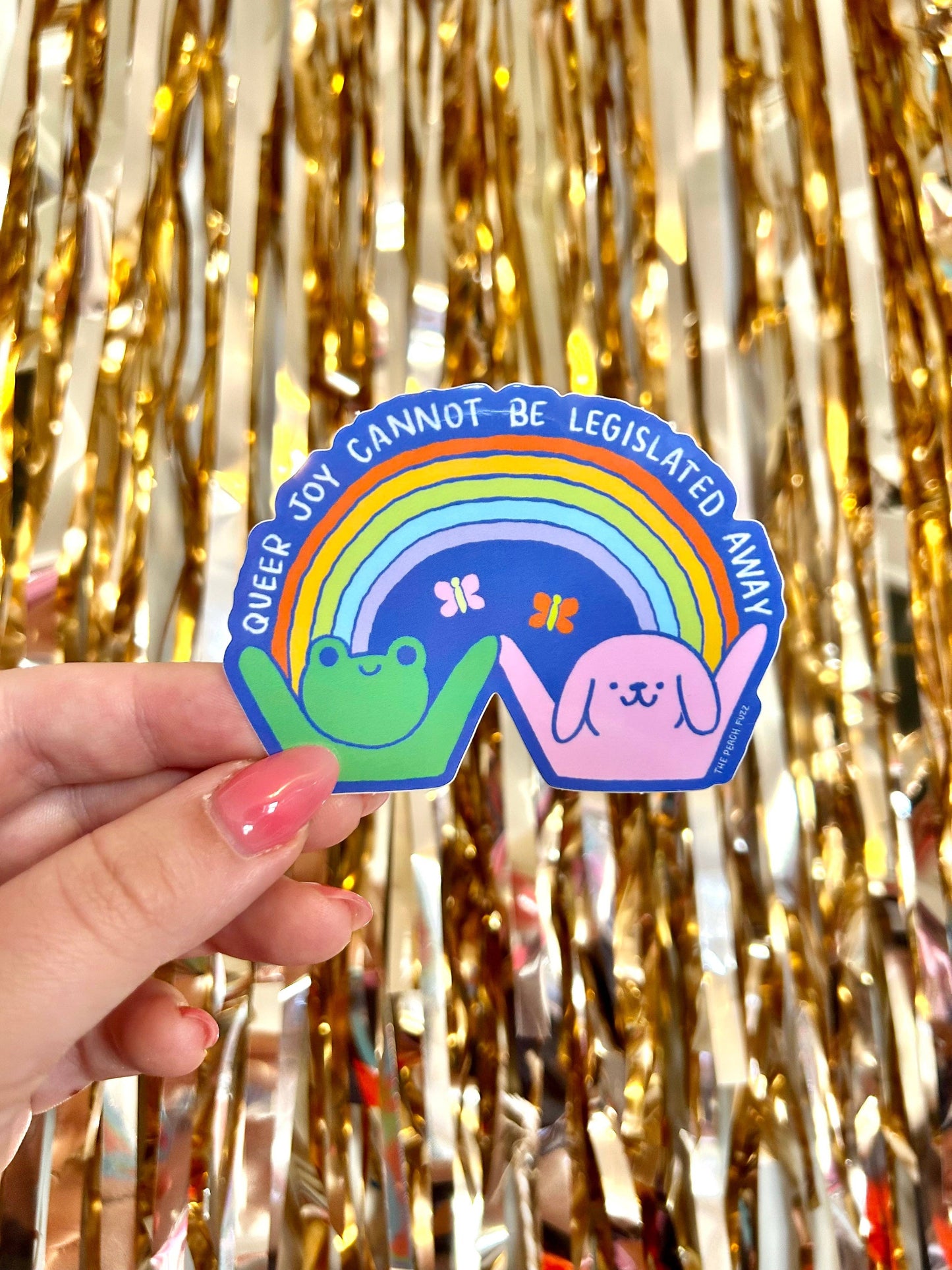 The Peach Fuzz - Queer Joy Cannot Be Legislated Away Sticker